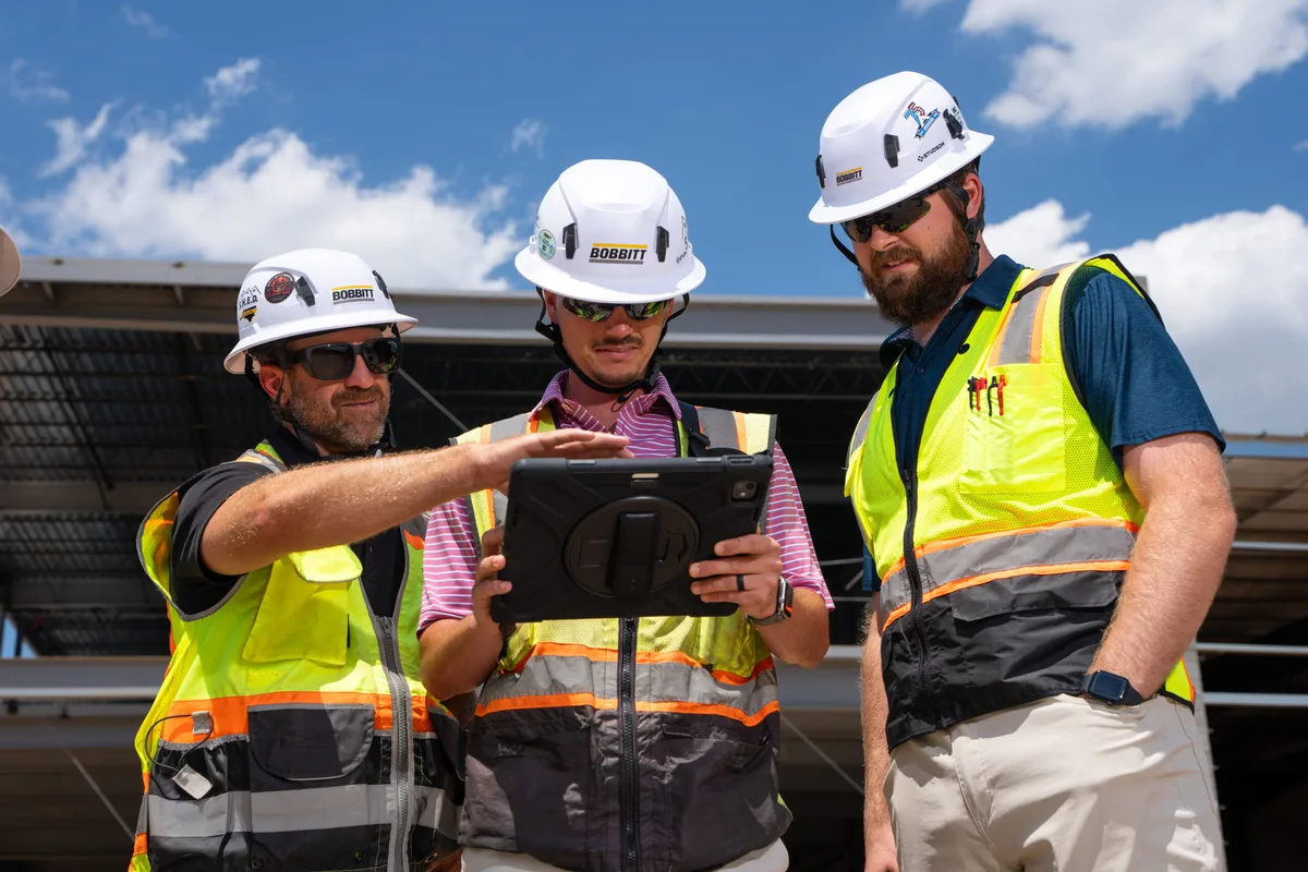 Bobbitt construction team reviewing site progress